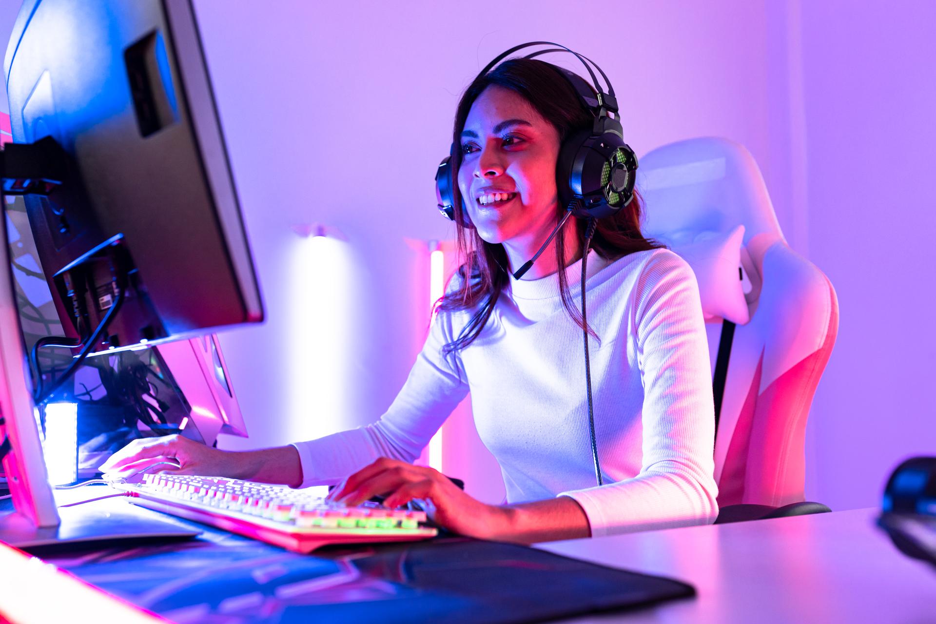 Active teen girl playing game in vr headset, having fun in virtual reality world